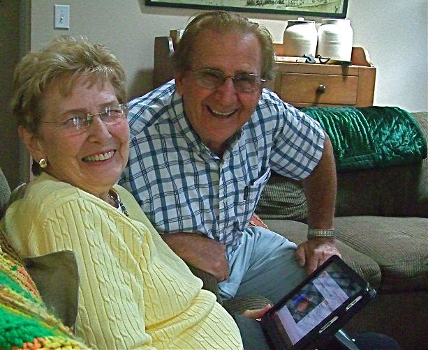 Smiling Couple with iPad