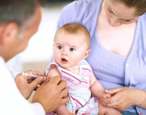 Baby Recieves Vaccination from Physician