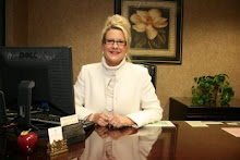 Denise Price Thomas at her Desk